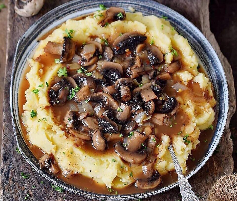 Mashed potatoes with a hearty mushroom lentil stew